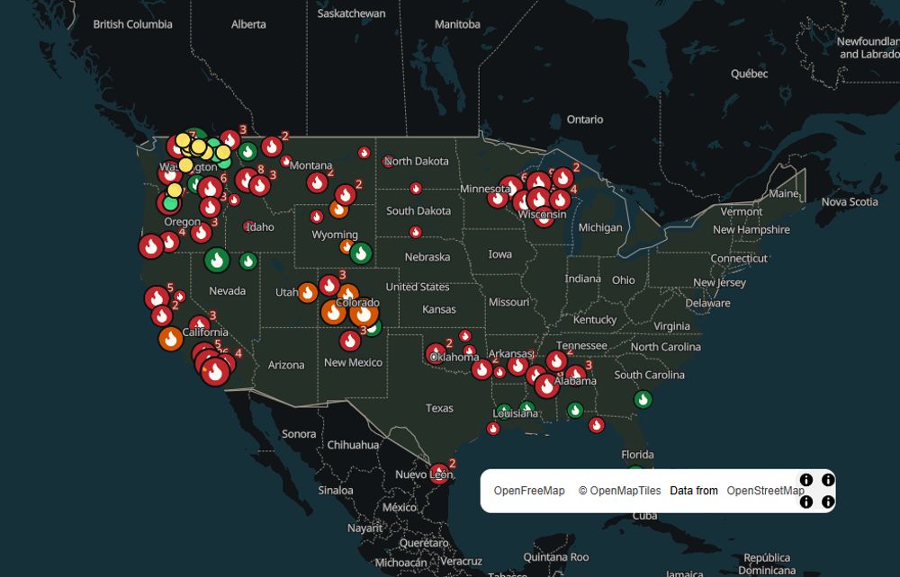 The SpikeCamp national map, with active US wildfires marked across the country